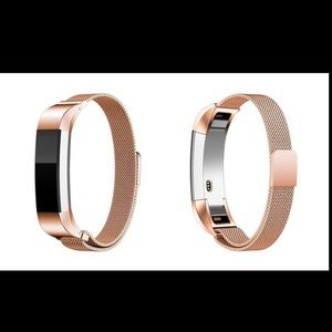 Two Alta Fitbit bracelets. Gold and Mocha colors
